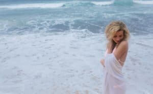 Beautiful young woman on beach
