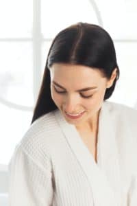 Beauty woman clean healthy skin, natural make-up spa cosmetology concept long dark hair