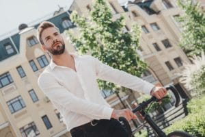 Success usually comes to those who are too busy to be looking for it. Young brown-haired man